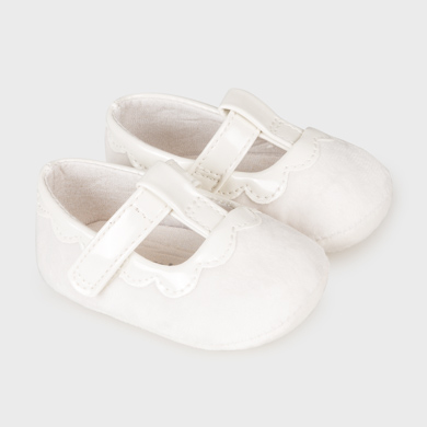 newborn white shoes girl