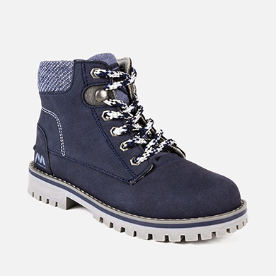 Botim de pele montanha menino