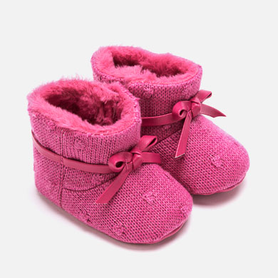 Knit booties for newborn girl