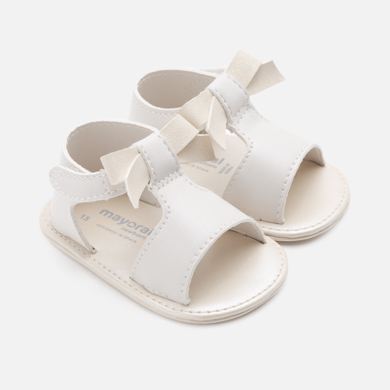 white newborn sandals