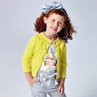 girl in the yellow cardigan