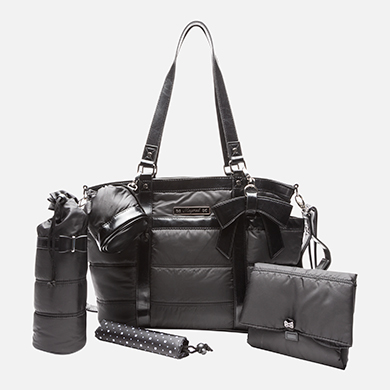 Bolso de bebé en microfibra y polipiel con complementos