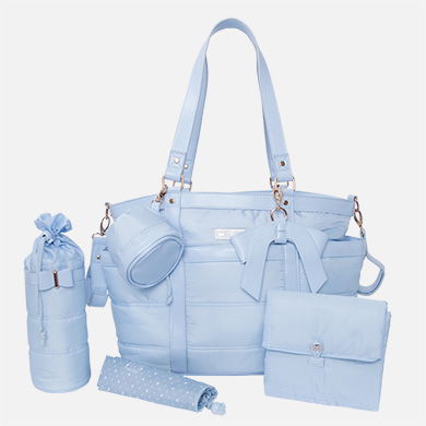 Bolso de bebé en microfibra y polipiel con complementos